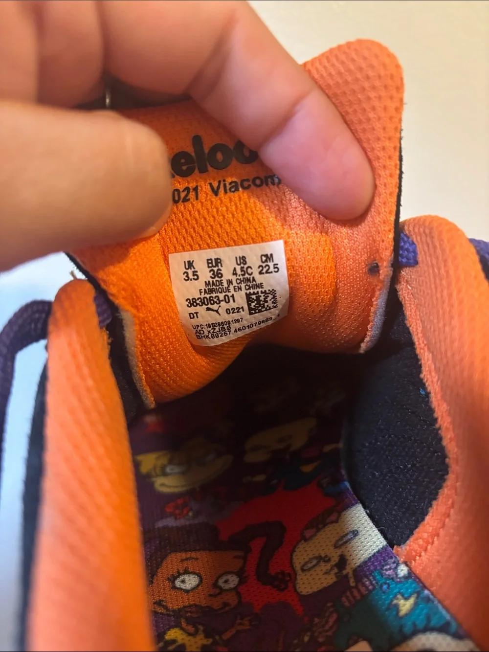 Puma Kids Black Sneakers with Purple Laces and Orange Interior Trim